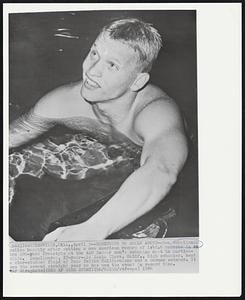 Something to Smile About -- Don Schollander smiles happily after setting a net American record of 1:42.6 tonight in the 200-yard freestyle at the AAU indoor men's swimming meet in Bartlesville. Schollander, 17-year-old Santa Clara, Calif., high schooler, beat a star-studded field of four fellow Californians and a German swimmer. It was the second straight year he has won the event in record time.