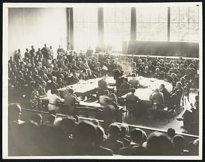 Those Vacant Seats While other delegates sat around the League of Nations council table, two chairs in the center (far side of the table) were vacant. They belong to the Italian envoys who left the room every time an Ethiopian made a speech. Negotiations, begun Sept. 4, are continuing, Premier Pierre Laval of France siding with Britain Sept. 13 for upholding the League covenant against war.