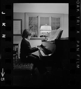 Bruce Irving's child playing the piano