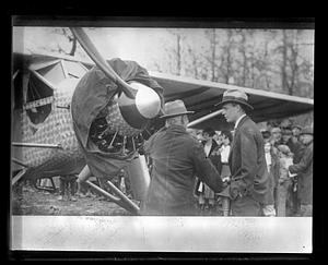 Charles Lindbergh speaking to someone in front of his plane, "Spirit of St. Louis"