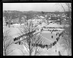 Ice hockey being played outdoors