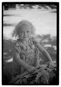 Girl holding decorated hoop