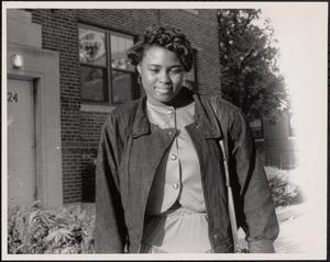 Stylish young woman outside Newtowne Court