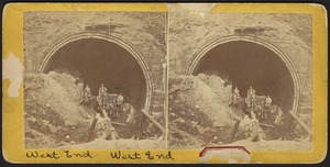 West entrance of arch, with miners on cart