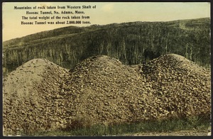 Mountains of rock taken from western shaft of Hoosac Tunnel, No. Adams, Mass. the total weight of the rock taken from Hoosac Tunnel was about 2,000,000 tons