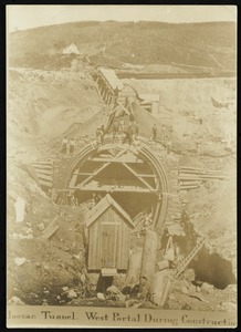 Hoosac Tunnel, its surroundings, workers, and machinery. West portal during construction
