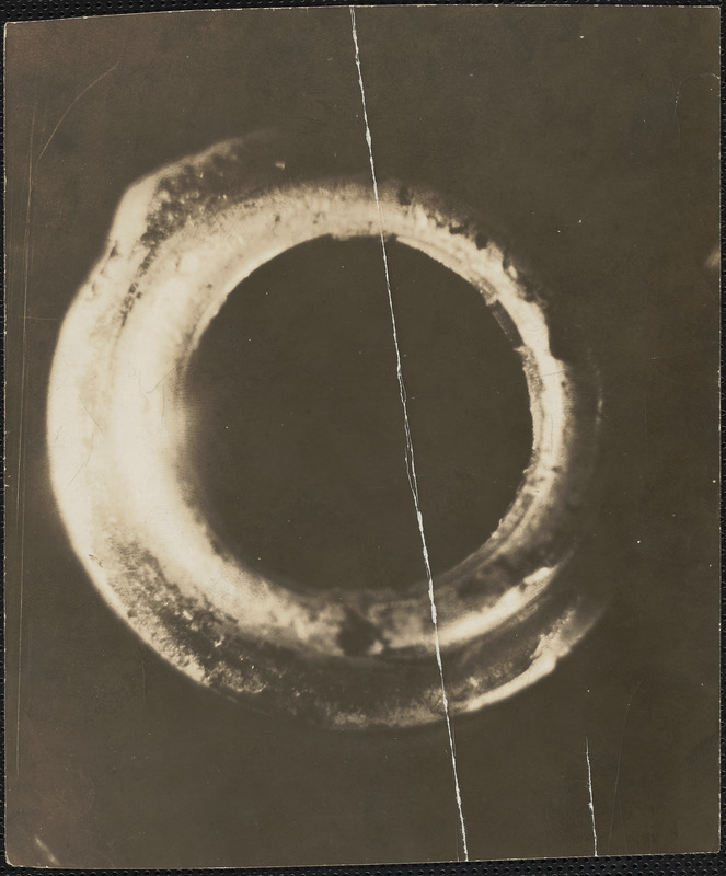 Photograph of bullet made by James E. Burns, direct view of one land ...