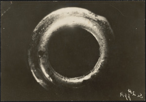 Photographs of bullet made by James E. Burns, the bullet turned to the right