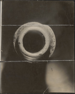 Photographs of bullet made by James E. Burns, complete circle of the bullet