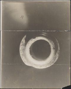 Photographs of bullet made by James E. Burns, one land to the front