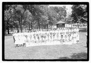 Group holding circular emblems