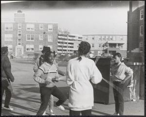 Girls jumping rope outside