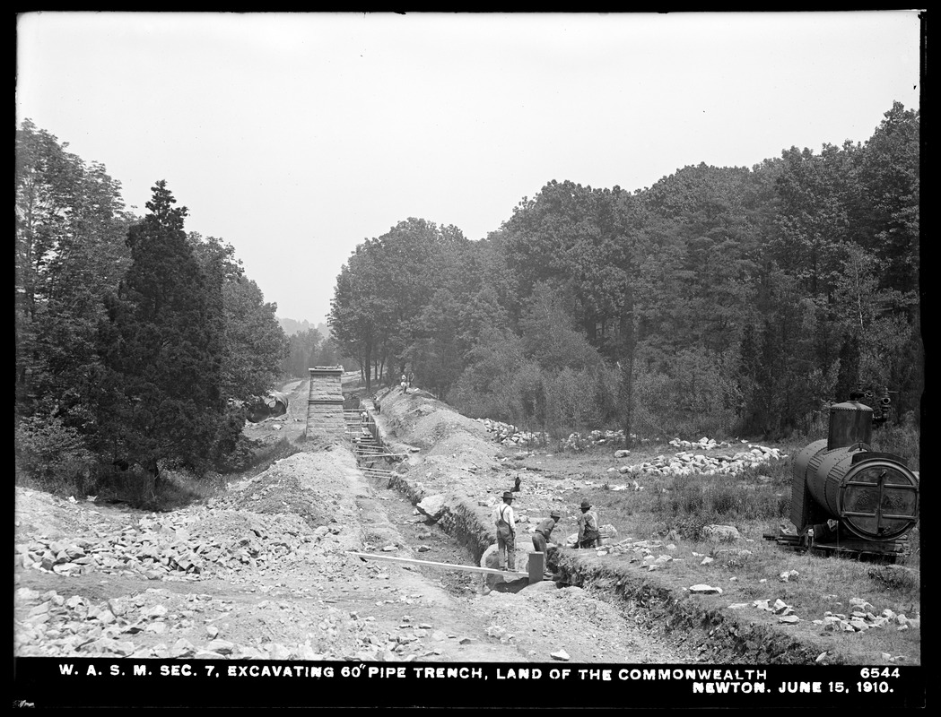 Distribution Department, Weston Aqueduct Supply Mains, Section 7, excavating 60-inch pipe trench, land of the Commonwealth; Cochituate Aqueduct, ventilator in background, center, Newton, Mass., Jun. 15, 1910