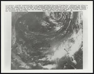 Greenbelt, MD.: This photo partially showing Florida (far left) and the Atlantic Ocean was taken from an altitude of 675 statue miles and received at the Goddard Space Flight center, here 5/16, the eve of the Gemini 9 launching. The primary recovery are (arrow) for Gemini o is shrouded under clouds. Cuba can be seen at lower left. The photo was made by Nimbus II, which was launched by NASA 5/15.