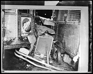 Auto jammed between st. car 1934