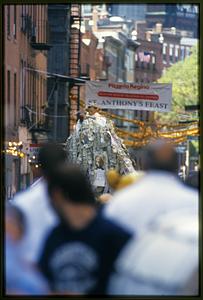 Boston - North End 2002: Covered with donations statue of St. Anthony of Padua is paraded around the city's Italian district