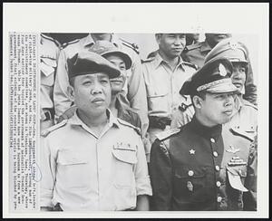 Strongmen of Laos' Coup -- Gen. Kouprasith Abhay, left, leader of right-wing military junta, and Gen. Siho Lamphoutacoul, strong man of the revolutionary committee, are shown in Vientiane, Laos, Thursday, where four days earlier they toppled the government of neutralist Premier Souvanna Phouma. While the junta leaders have urged Souvanna to form a new government, final solution of the country's crisis is being blocked by pro-Communist Pathet Lao.