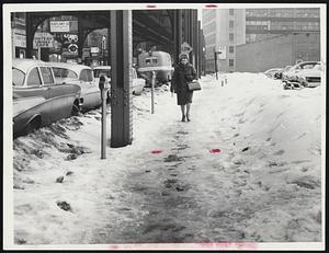 Step Lightly or suffer a fall, that's a basic rule of life in the South End with the Washington street sidewalks covered with ice and slush. Quite a few persons have experienced the unpleasant sensation of taking a spill.