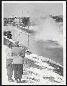 Storm surge over coastal street