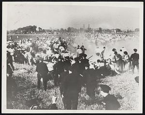 On the Labor Battle Front. Police charging into steel strike sympathizers during the fatal riot on Memorial day near the Republic Steel Corporation plant in South Chicago where ten men were slain and several score injured.