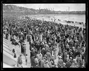 A crowd of people on a beach