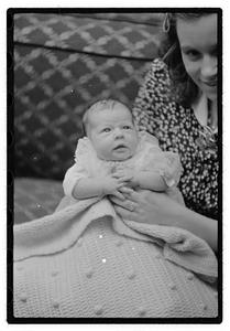 Unidentified baby, possibly in a christening gown