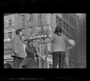 Singing anti-war war songs, downtown Boston