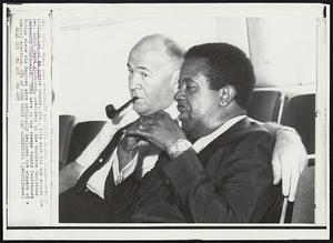 Sheriff and Civil Rights Leader - Sheriff William Lee of Greene County, Ala., sits with his arm around the Rev. Ralph David Abernathy, president of the Southern Christian Ledership Conference. They were in the Greene County Courthouse Friday where six Negroes were officially declared the winners of a special election.