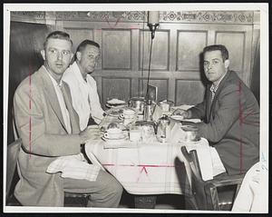 Red Sox Opponents are shown at the Hotel Kenmore before going to Fenway Park for today's game. Seemingly the most worried of the three Detroit Tigers is Jack Phillips (left), while pitcher Steve Gromek (center) appears slightly skeptical. Ray Boone (right) is just mildly curious because he welcomes trips to Boston, since he just about owns the left field fence.