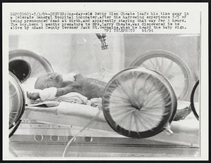 One-day-old Bobby Glen Choate loafs his time away in a Colorado General Hospital incubator, after the harrowing experience 5/5 of being pronounced dead at birth, and apparently staying that way for 3 hours. The boy, born 3 months premature to Mrs. Larry Choate, was discovered to be alive by Adams County Coroner Jack St. Germaine, when he heard the baby sign.