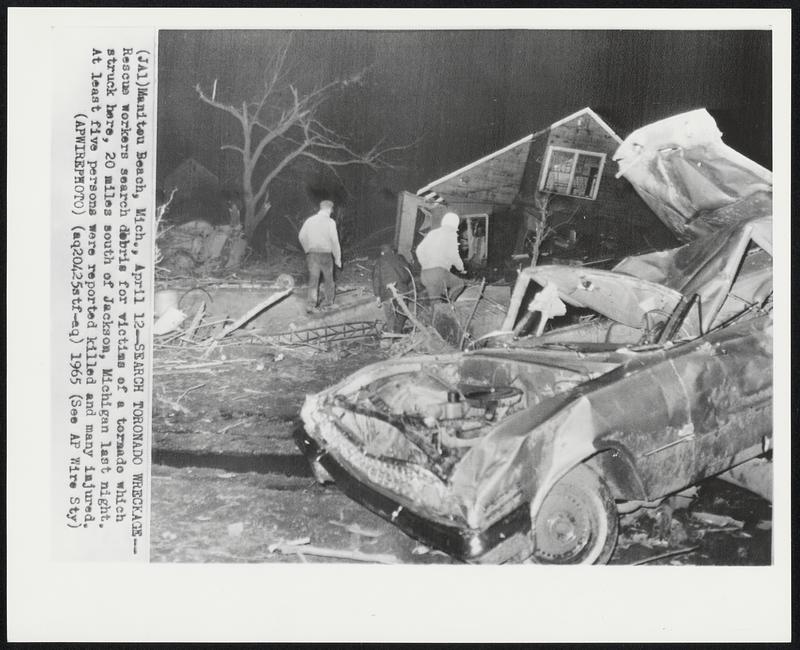 Manitou Beach, Mich. – Search Tornado Wreckage – Rescue workers search debris for victims of a tornado which struck here, 20 miles south of Jackson, Michigan last night. At least five persons were reported killed and many injured.