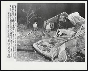 Manitou Beach, Mich. – Search Tornado Wreckage – Rescue workers search debris for victims of a tornado which struck here, 20 miles south of Jackson, Michigan last night. At least five persons were reported killed and many injured.