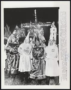 Members of the Ku Klux Klan of America met near Irmo, SC late 7/19 to hear Robert Shelton, Imperial Wizard, speak. More than a 1,000 persons listened as Shelton accused President Johnson of "following the policy of the communist party in enacting the Civil Rights Law".