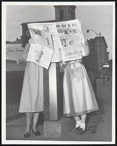 "Catchin' up on the news" Hidden behind papers LtR. Miss Jewel M Bland. Miss Janet A Byron both of Westwood.
