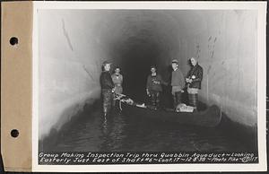 Contract No. 17, West Portion, Wachusett-Coldbrook Tunnel, Rutland, Oakham, Barre, group making inspection trip through Quabbin Aqueduct, looking easterly just east of Shaft 6, Rutland, Mass., Dec. 8, 1938