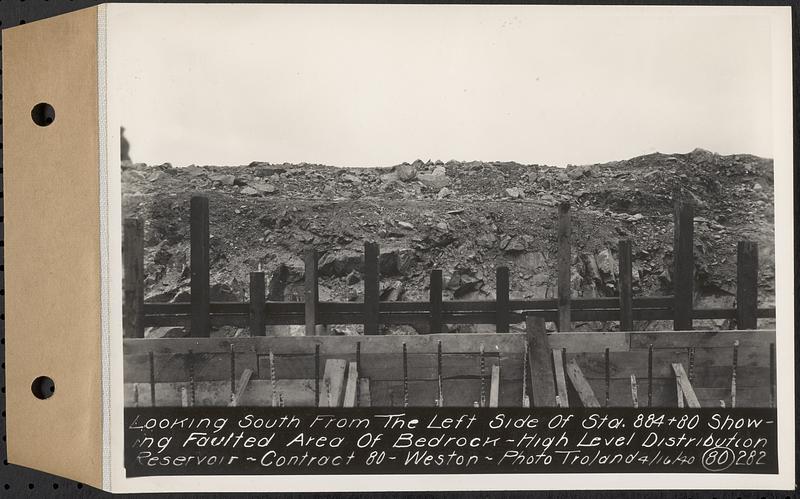 Contract No. 80, High Level Distribution Reservoir, Weston, looking south from the left side of Sta. 884+80 showing faulted area of bedrock, high level distribution reservoir, Weston, Mass., Apr. 16, 1940