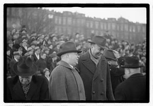 Boston Parks Department Commissioner William Long watching a football game, Back Bay Fens