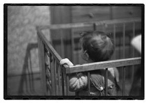 Toddler in crib