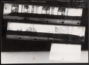 Contact sheet featuring two girls posing in a doorway