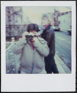 Boy photographing the photographer