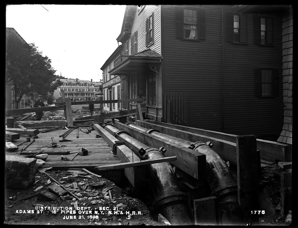 Distribution Department, Southern High Service Pipe Line, Section 21, Adams Street, two 16-inch pipes over New York, New Haven & Hartford Railroad, Dorchester, Mass., Jun. 21, 1898