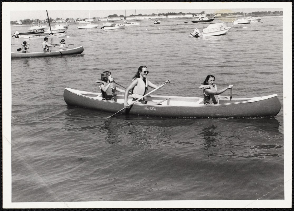 3 people in a canoe