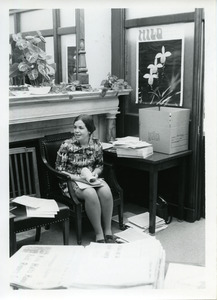 Karen Lewis '73 doing office work