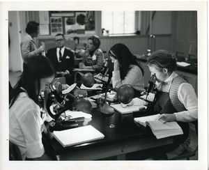 Abbot Academy science students using microscopes