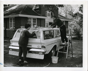 Abbot Academy students washing car including Ellen Sobiloff, Class of 1966