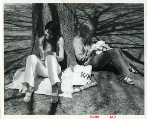 Sue McCouch (?) '71, Julia Gilbert '72 studying outside