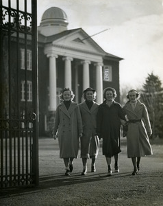 Abbot Academy students walking through Merrill Gate