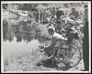 Fishing Derby Start was filled with enthusiastic youngsters of the Crotched Mountain Rehabilitation Center for Crippled Children at Greenfield, N. H. The third annual event was sponsored by nearby fish and game clubs which supply all the equipment used by the youngsters at the derby.