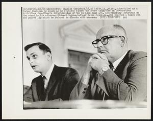 Charles Christmas, 48, of Amite, La., right, identified as a former Klansman is shown as he appeared before the House Committee on Un-American Activities Committee's investigation of the Ku Klux Klan 1/5. Accompanying Christmas on the stand is his attorney, Michael Ingram, left, of Baton Rouge, La., who sported a black eye and puffed lip which he refused to discuss with newsmen.