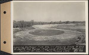 Contract No. 80, High Level Distribution Reservoir, Weston, looking southeast from Sta. 111+/- showing circle at end of dam 5 and riprap, high level distribution reservoir, Weston, Mass., May 29, 1940